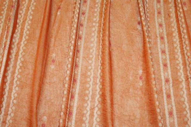 Vendita on line tessuto doppia organza arancio con fiore ricamato - prodotti