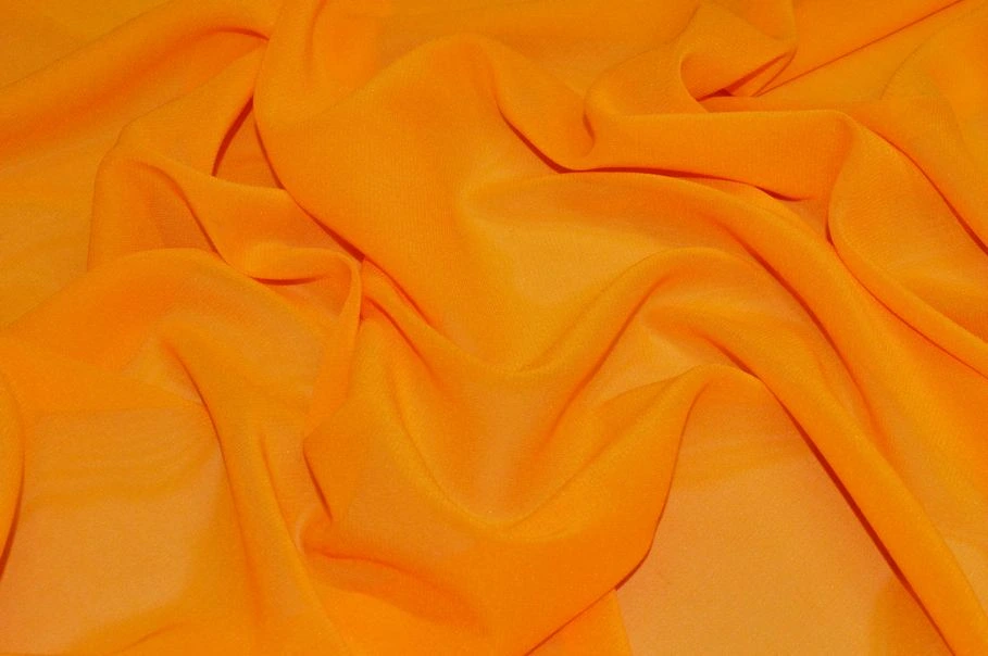 Vendita on line tessuto crepe georgette in seta stretch giallo sole - tessuti abbigliamento sete