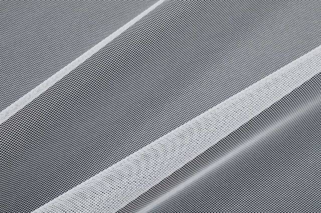 Vendita on line tullone rigido bianco - tessuti abbigliamento
