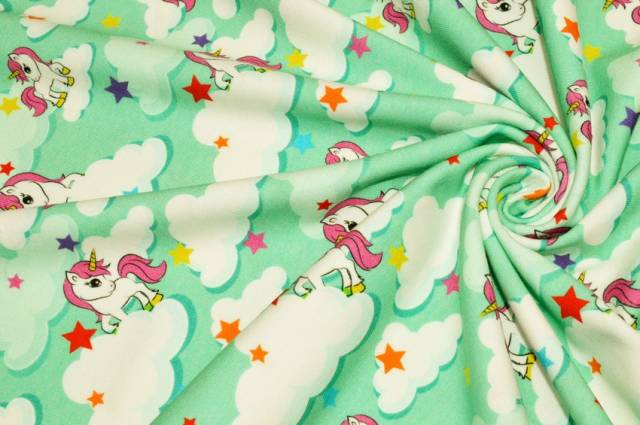 Vendita on line tessuto maglina cotone fantasia unicorno turchese - tessuti abbigliamento