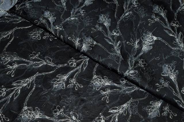 Vendita on line tessuto broccato fiore stilizzato fondo nero - tessuti abbigliamento