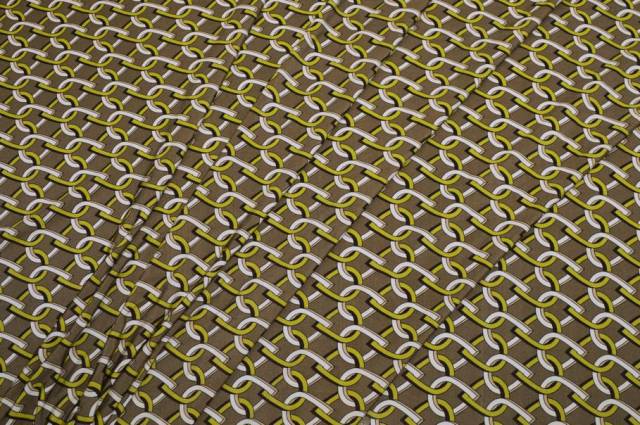 Vendita on line tessuto maglina viscosa fantasia geometrica verde - tessuti abbigliamento